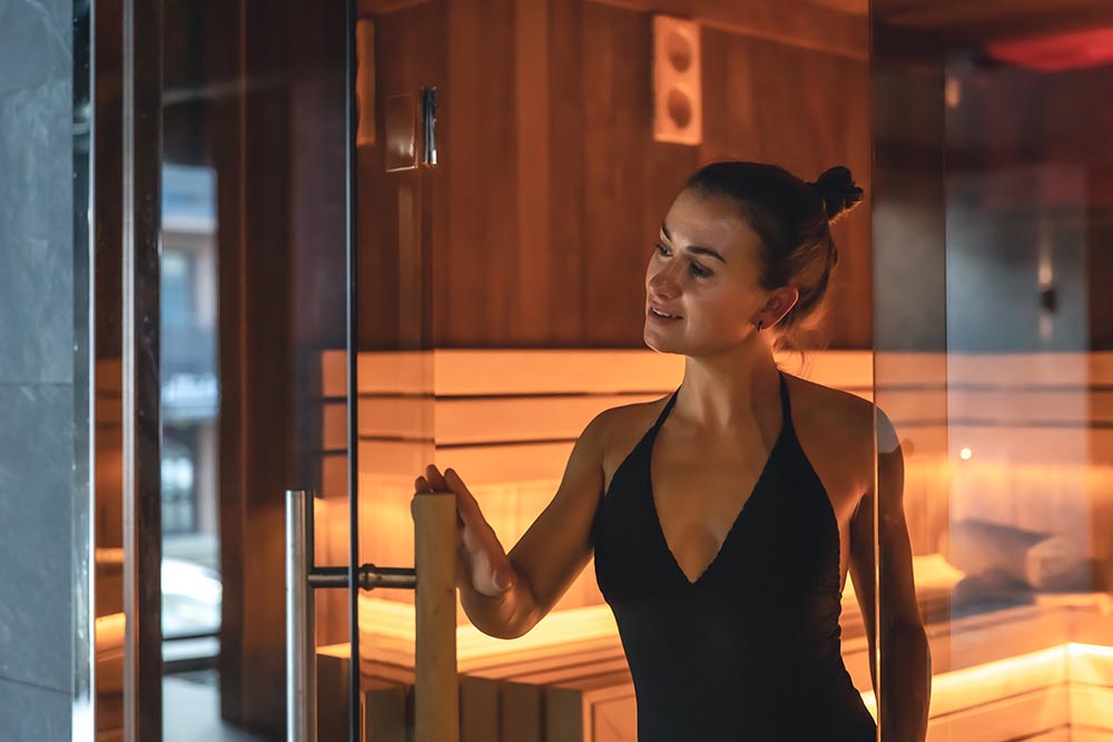 young woman having rest sauna alone