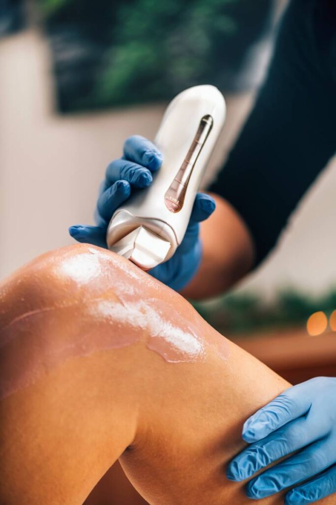 Waxing Legs Procedure in a Beauty Center