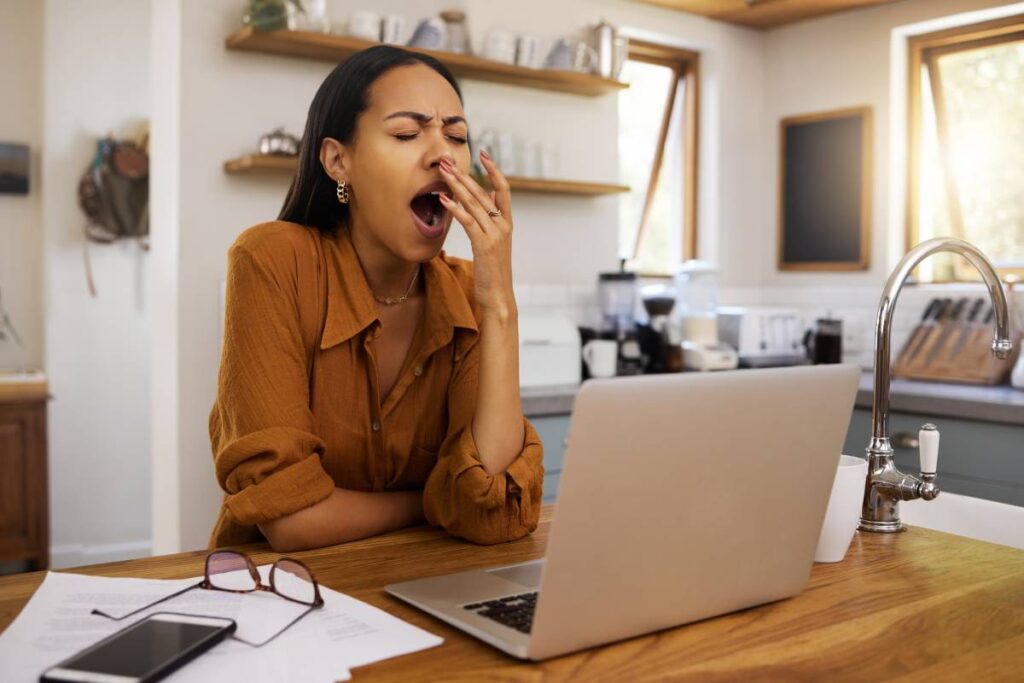 bored mixed race businesswoman yawning while going 2023 11 27 05 08 34 utc (1)