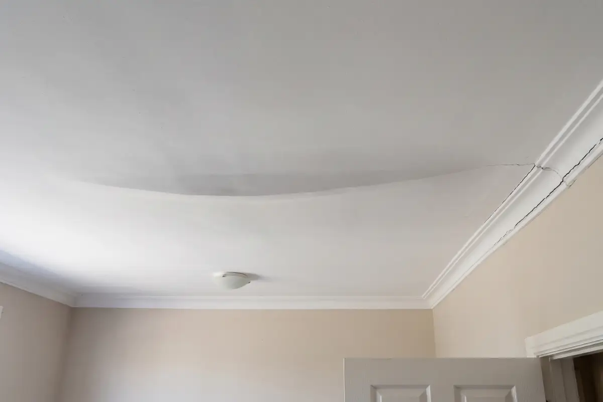 sagging plasterboard ceiling crack Sagging plasterboard ceiling with cracked cornice line